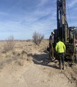 man working in New Mexico with drill rig doing a geotechnical investigation